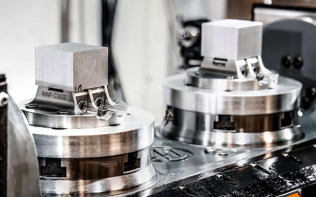 CNC machine tool holders with metallic finish in workshop