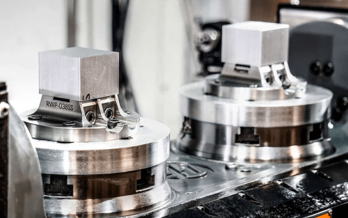 CNC machine tool holders with metallic finish in workshop