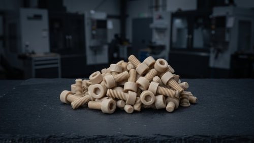 Assorted CNC machined screw types with different head styles