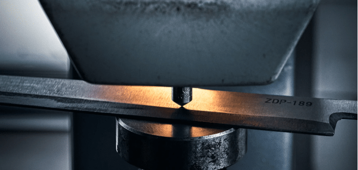 Alloy steel part being machined with CNC tool