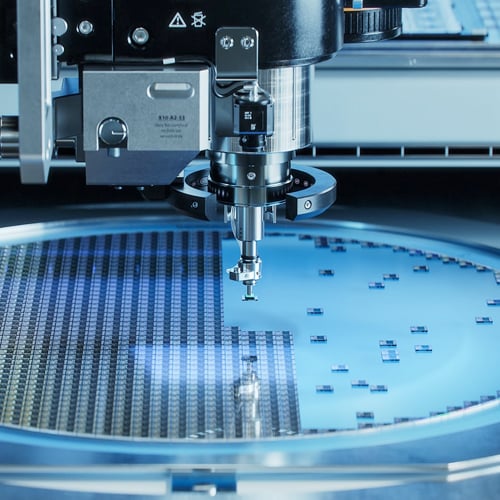 Precision machine processing electronic components on a wafer