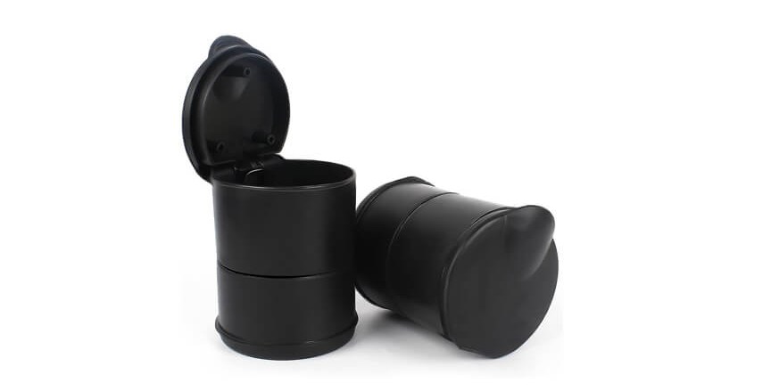 Two black plastic containers with lids open and closed
