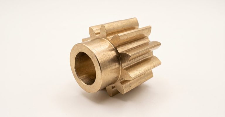 Brass gear with machined teeth and central bore
