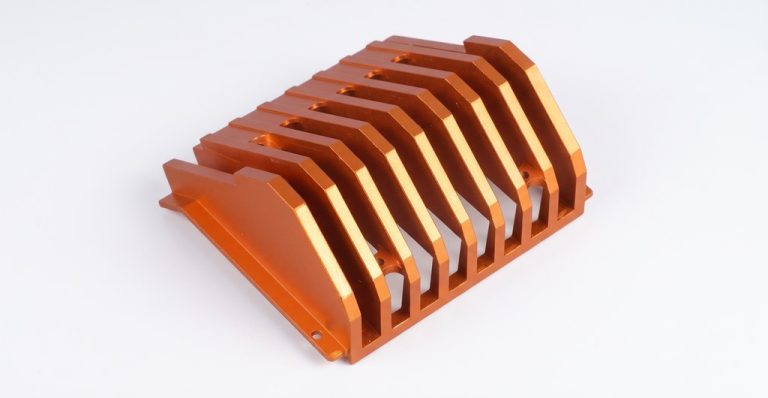 Orange aluminum heat sink with machined fins
