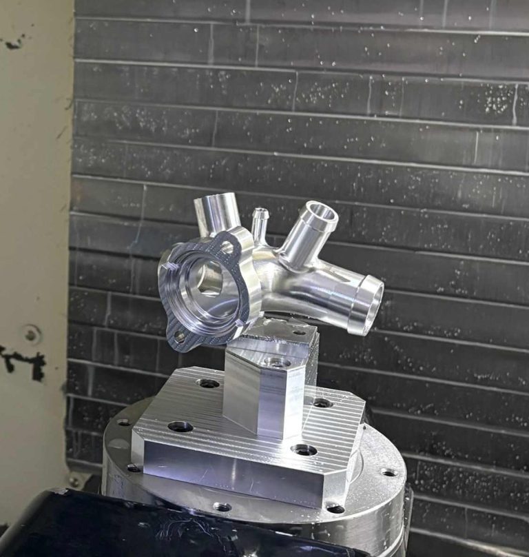 Complex aluminum part machined on a 5-axis fixture