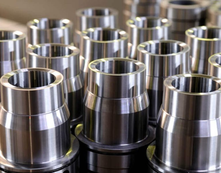 Cnc-machined metal bushings or bearing seats in rows