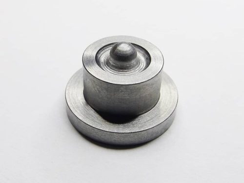 Single precision machined steel component on white