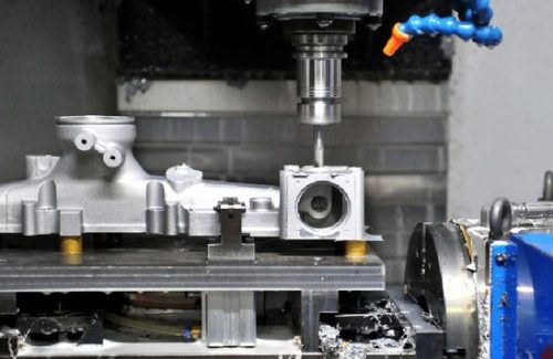 Cnc milling machine cutting aluminum prototype part