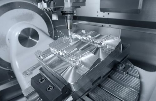 CNC machined aluminum 6082 part during 5-axis milling