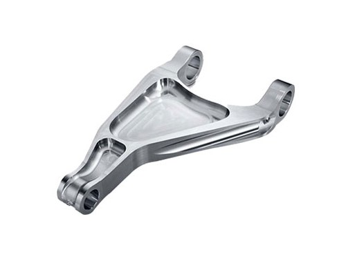 Complex machined aluminum bracket on white background