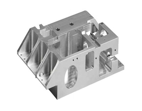 Aluminum machined housing part on white background