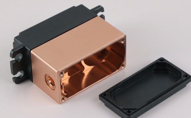 Copper and black machined enclosure with lid open