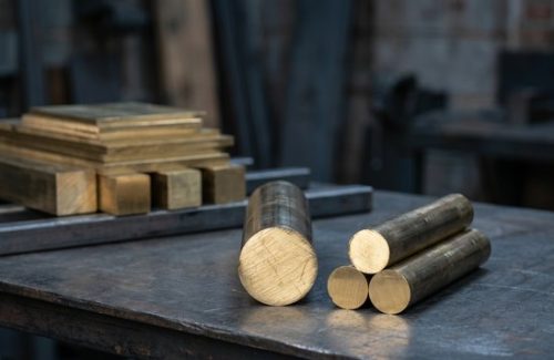 Raw brass CZ121 round bar stock before CNC machining