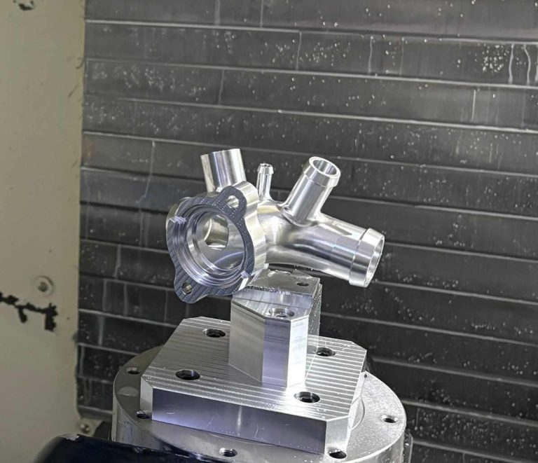 Complex aluminum part machined on a 5-axis fixture