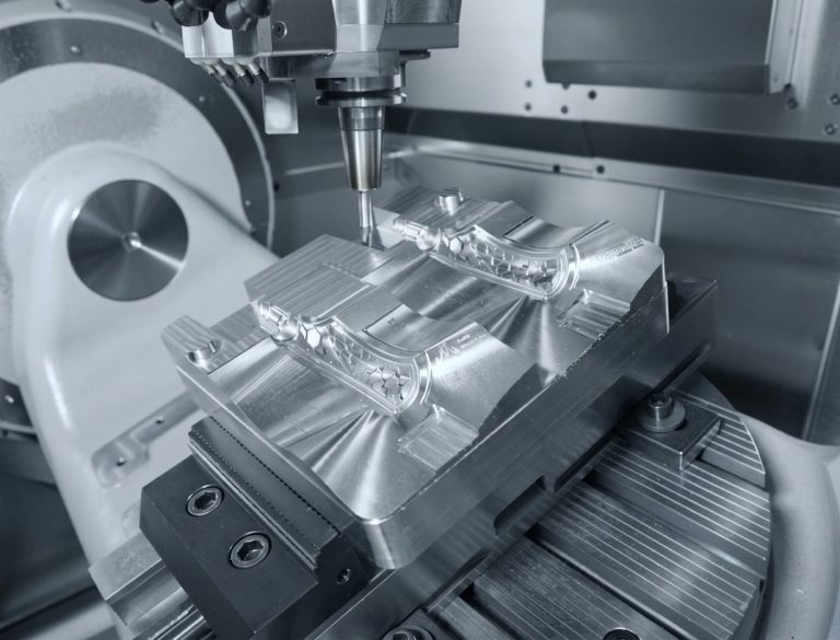 5-axis CNC machining of an aluminum prototype housing in progress