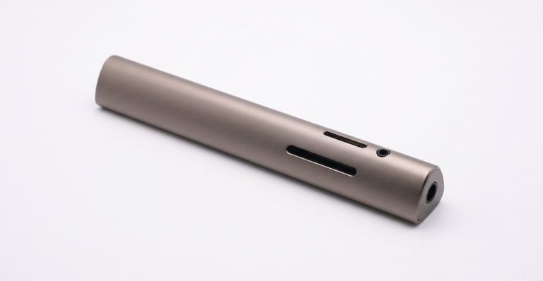 Machined metal laser pointer body with matte finish
