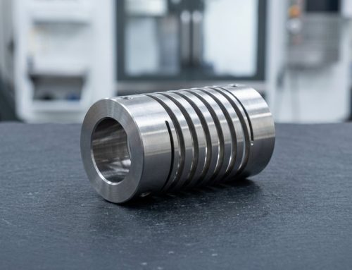 Helical beam coupling with slit flexure on worktable