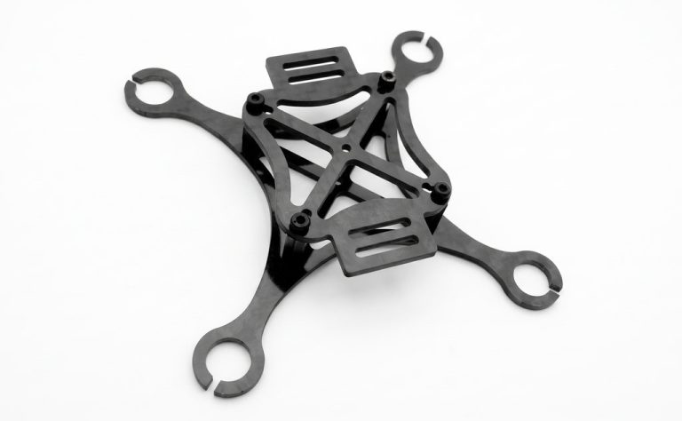 Black CNC-machined drone frame with four arms