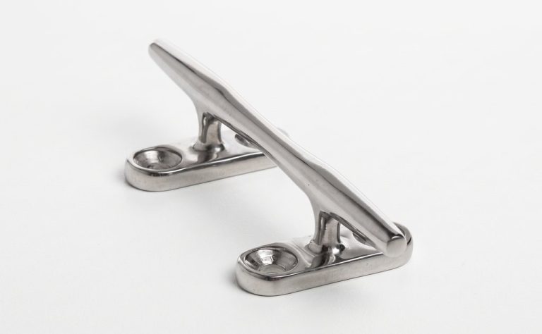 Shiny metal clamp part with mounting holes