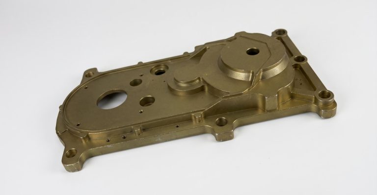 Bronze CNC machined housing part with precision features