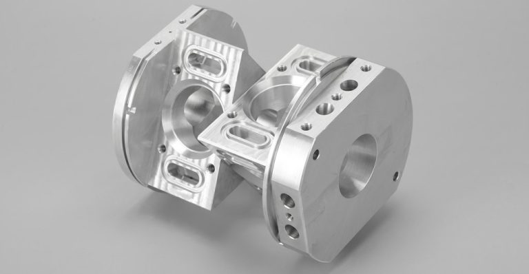 Precision machined aluminum part with complex geometry and holes