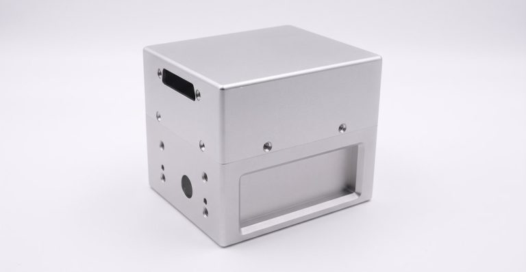 Machined aluminum enclosure with cutouts and mounting holes
