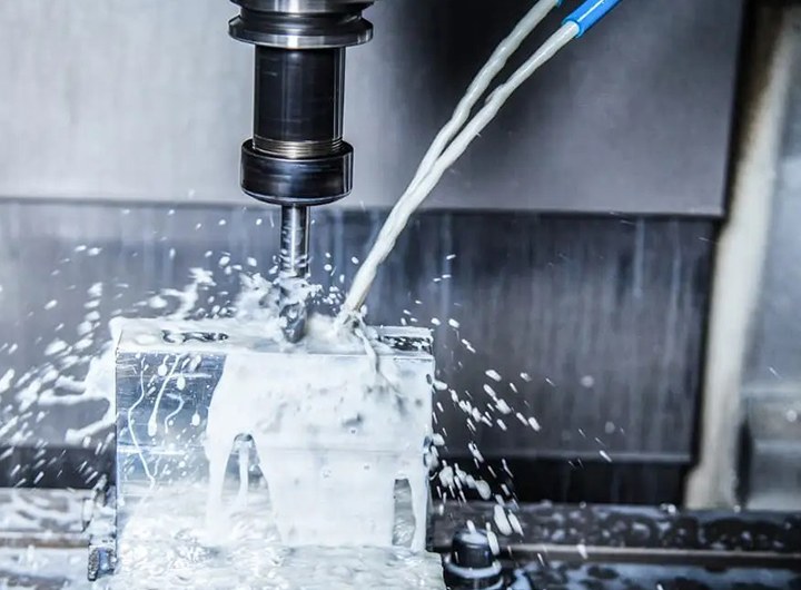 CNC drilling with coolant flood on a machining center