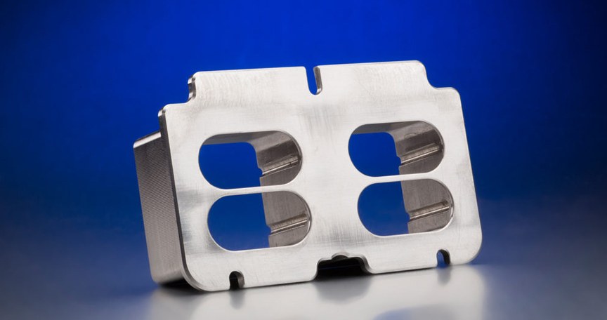 Metal bracket with cutouts on reflective surface