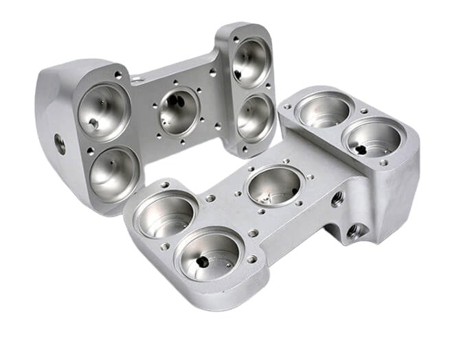 Cnc machined invar parts on white background