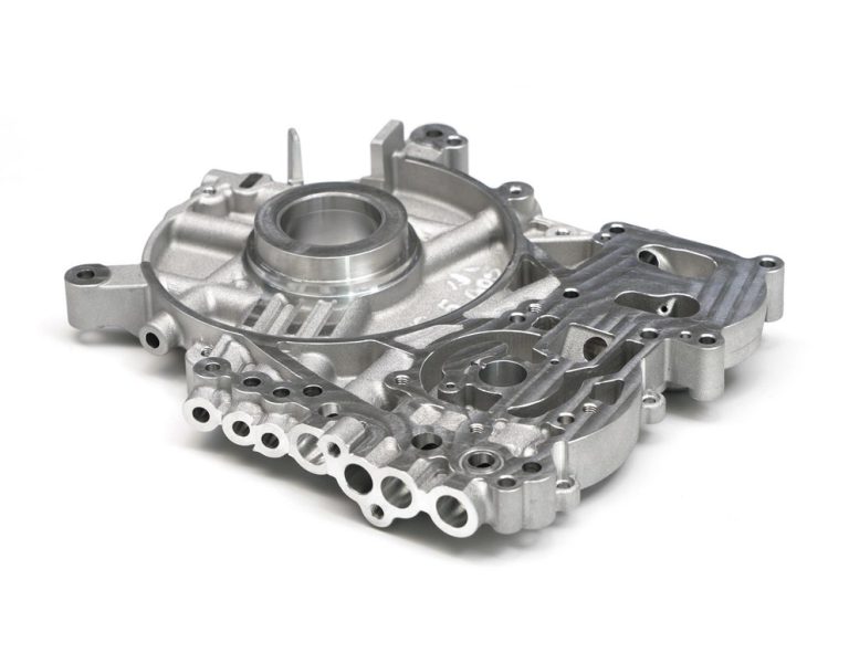 Complex machined metal housing with multiple bores and features