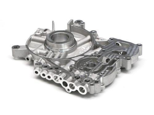 Complex machined metal housing with multiple bores and features