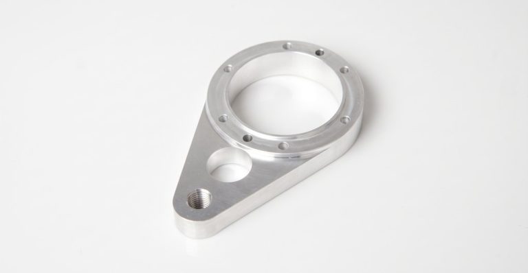 Machined aluminum marine coupling bracket with bolt holes
