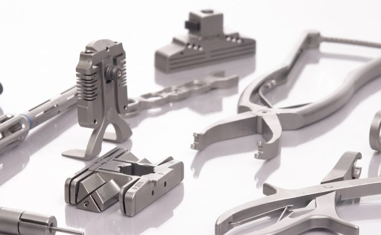 Precision machined medical instrument components in stainless steel