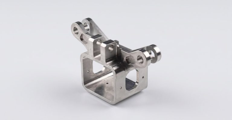 Precision machined metal bracket with smooth finish for medical use