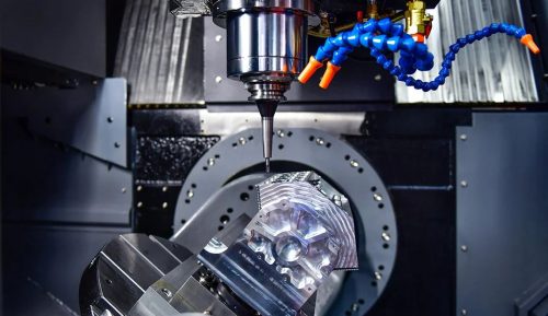 CNC milling cutter machining a stainless steel housing part