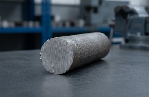 Raw mild steel 1018 round bar stock before machining