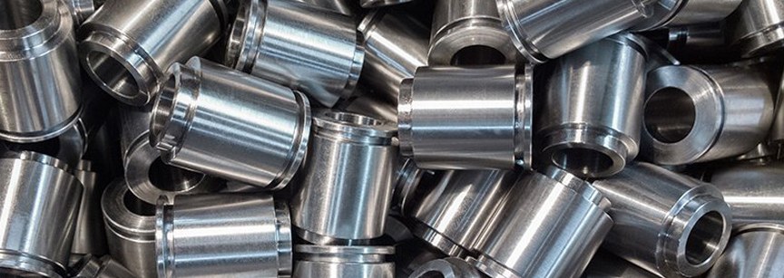 Pile of cnc-machined mild steel cylindrical parts