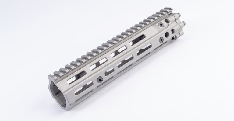 Aluminum CNC machined rail with mounting slots and textured top