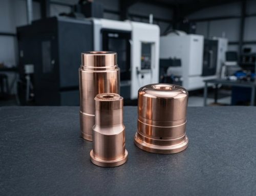 Copper sinker EDM electrodes on dark worktable surface