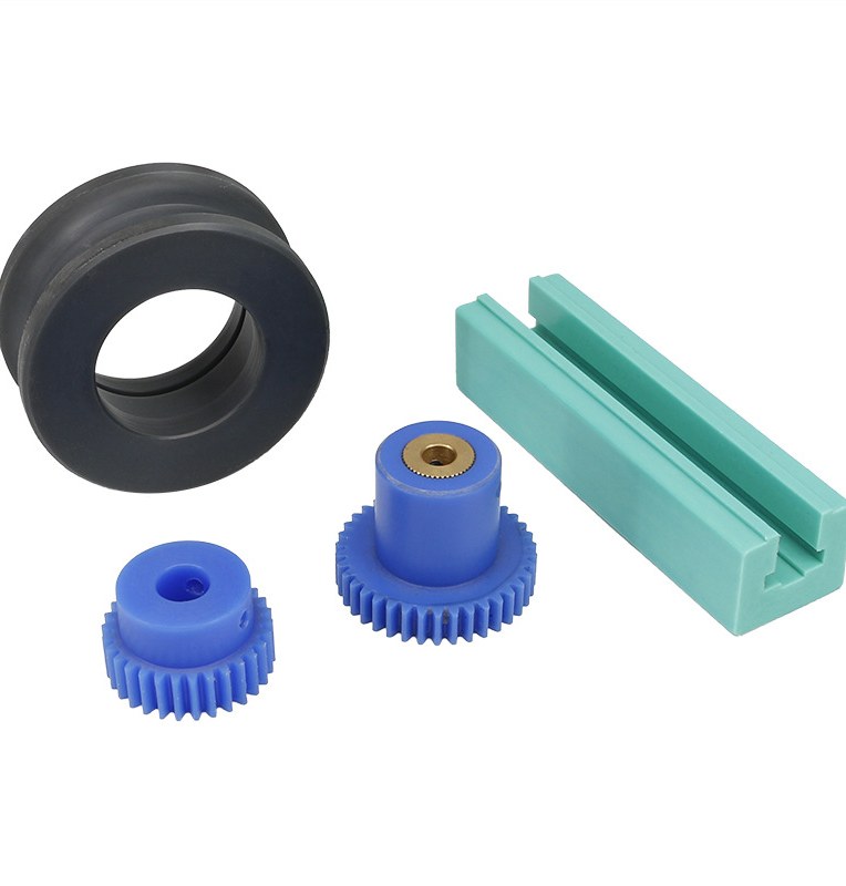 Nylon plastic machined parts on white background