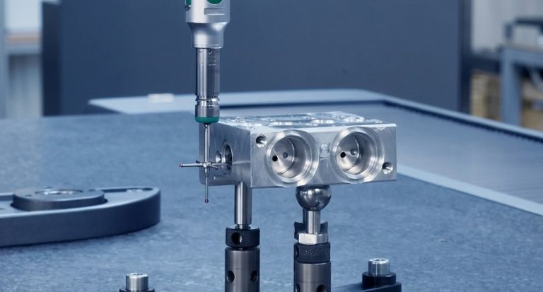 CMM machine measuring machined aluminum housing for quality check