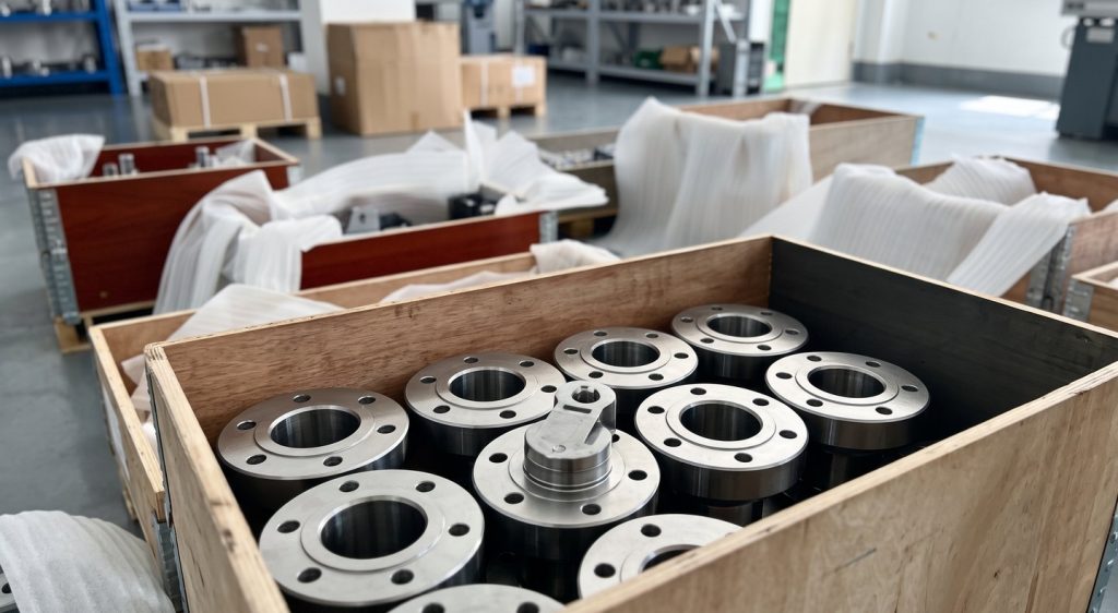 Machined stainless steel flanges packed in wooden crate for shipment