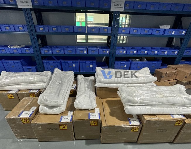 Machined aluminum housings packed in foam inside cardboard box