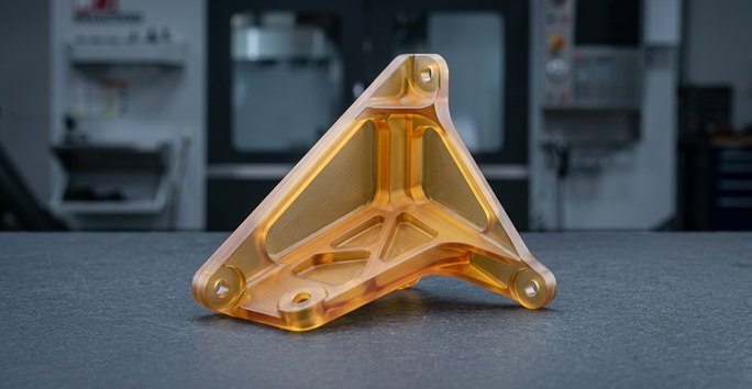 Ultem PEI aerospace cabin bracket on dark worktable