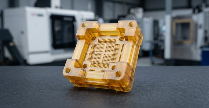 Ultem PEI test socket with micro-milled contact pockets