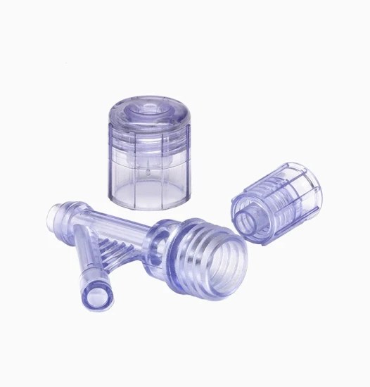 Small transparent plastic medical device parts isolated