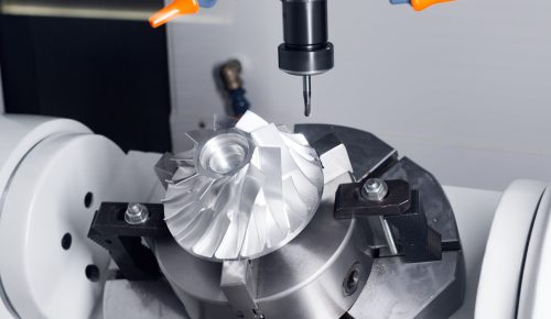 CNC mill cutting a precision machining services valve body bore