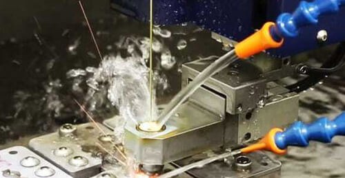 Wire EDM machine cutting hardened tool steel prototype insert
