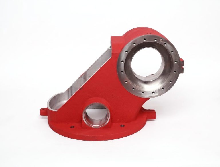Red and silver machined aluminum robot component