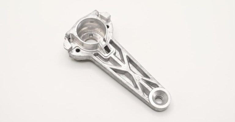 Machined aluminum robotic arm bracket with precision cutouts